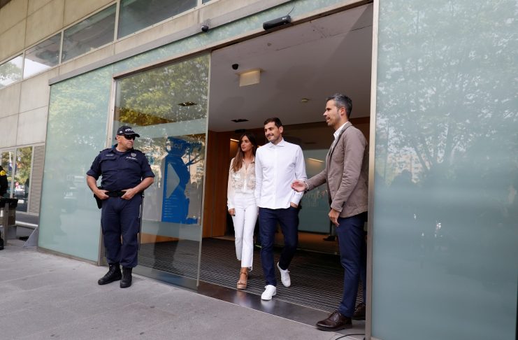 Spanish soccer player Iker Casillas leaves CUF Porto hospital accompanied by his wife Sara Carbonero in Porto
