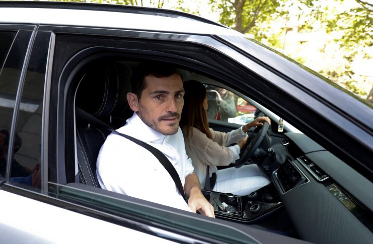 Spanish soccer player Iker Casillas leaves CUF Porto hospital accompanied by his wife Sara Carbonero in Porto