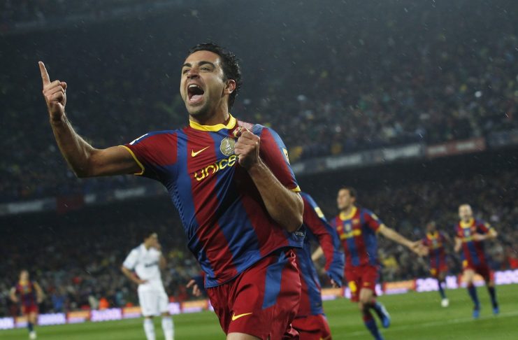 Barcelona’s Xavi celebrates after scoring against Real Madrid during their Spanish first division soccer match in Barcelona